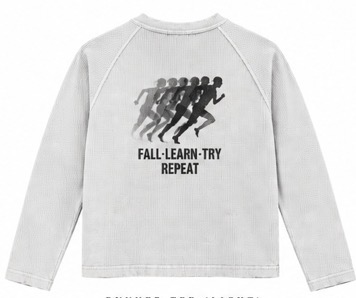 White AGAIN thermal back with runner progression and FALL LEARN TRY REPEAT text